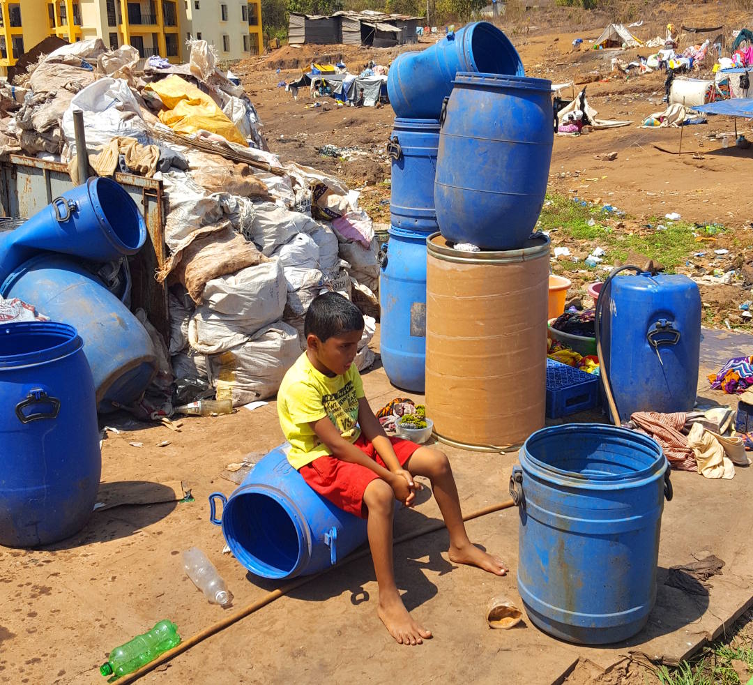 Abscent from school. Boy sitting in wasteground. Picture by Ian Russell