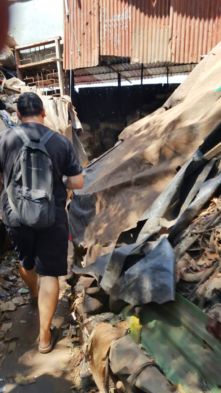 Robert making way to recycling center entrance. Picture by Ian Russell