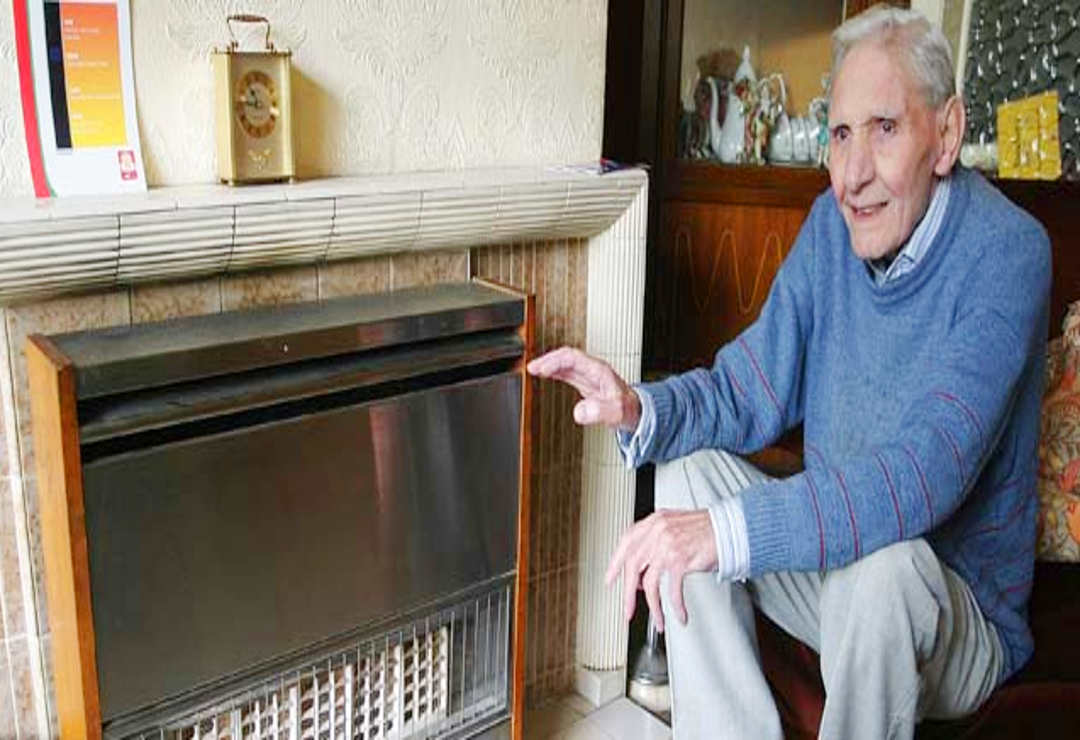 Man in front of fire