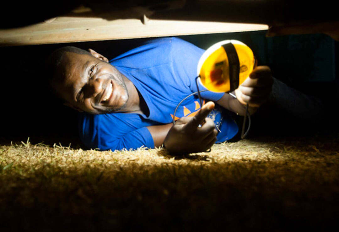 Man working by solar light